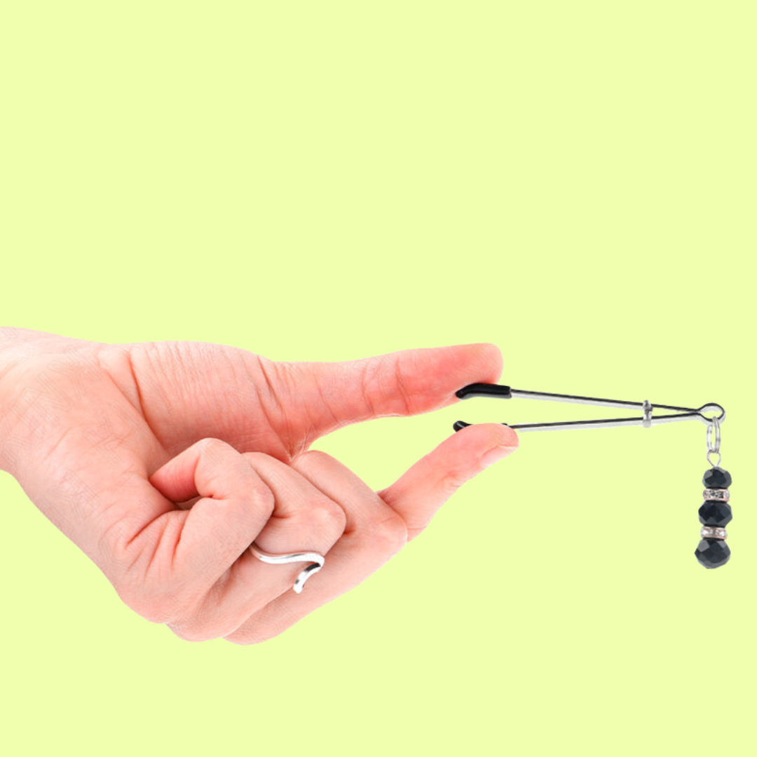 PINZAS PARA PEZONES CON TRIPLE BOLA NEGRO